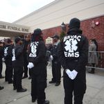 Members of the Bedford-Stuyvesant Volunteer Ambulance Corps lined the sidewalk outside the funeral home as a show of respect